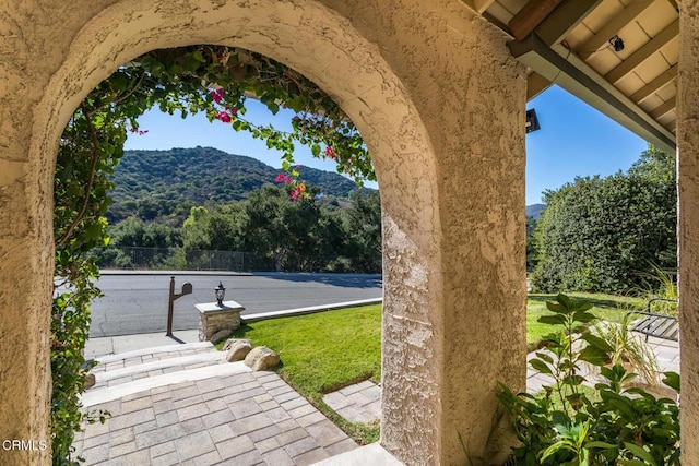 view of patio / terrace with a mountain view