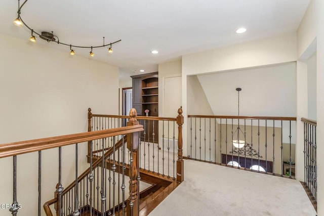 hallway featuring carpet