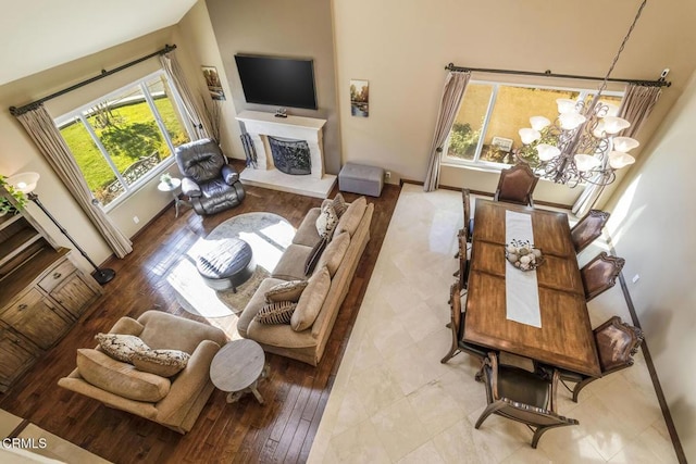 living room featuring a notable chandelier