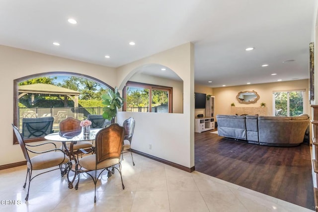 dining area featuring light tile patterned floors