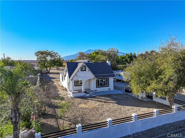 view of front of home with a mountain view