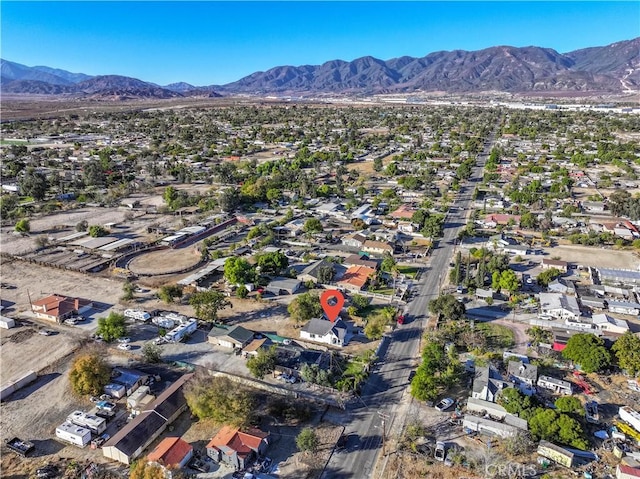 drone / aerial view featuring a mountain view