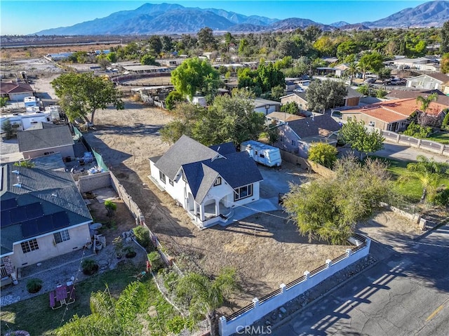 drone / aerial view featuring a mountain view