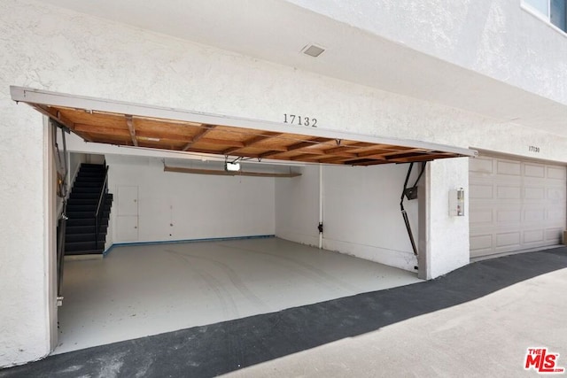 garage with a garage door opener