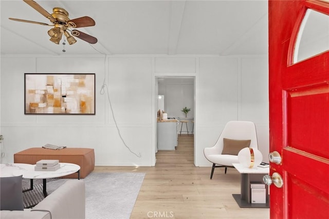 interior space with ceiling fan and light hardwood / wood-style floors