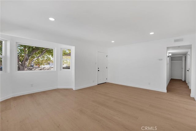 empty room featuring light hardwood / wood-style floors