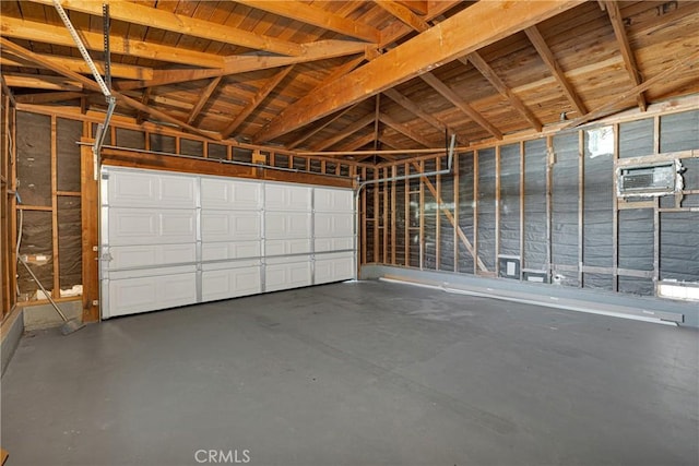 garage with an AC wall unit