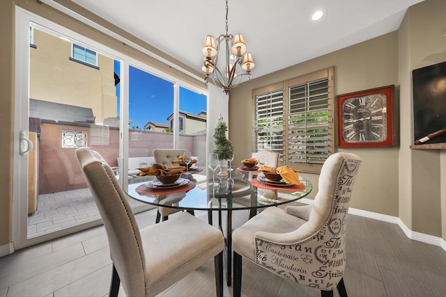 dining area with a notable chandelier