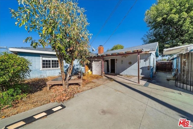 view of front of home featuring a patio area