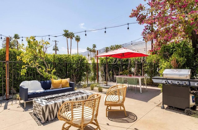 view of patio featuring grilling area and an outdoor living space