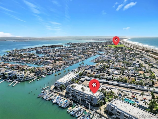 birds eye view of property featuring a water view