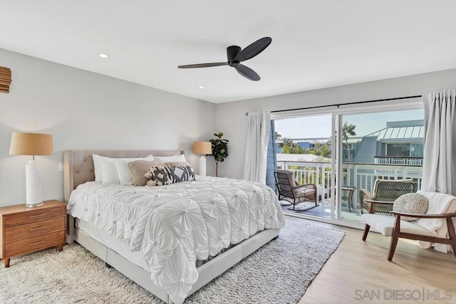 bedroom with access to exterior, light wood-type flooring, and ceiling fan