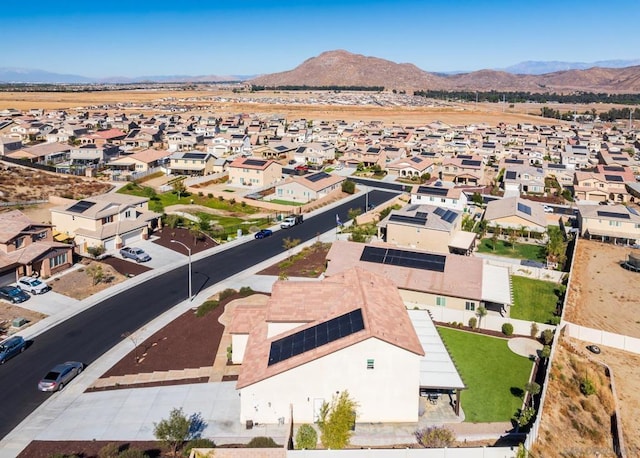 drone / aerial view featuring a mountain view