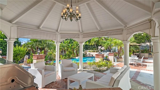 view of patio / terrace with a gazebo and a grill