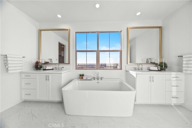 bathroom featuring a bathtub and vanity