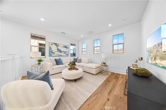 living room with light hardwood / wood-style floors