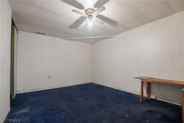 spare room featuring ceiling fan