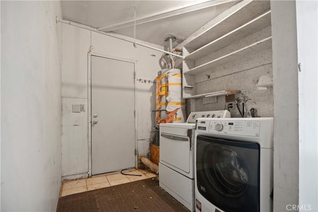 laundry area featuring washing machine and dryer