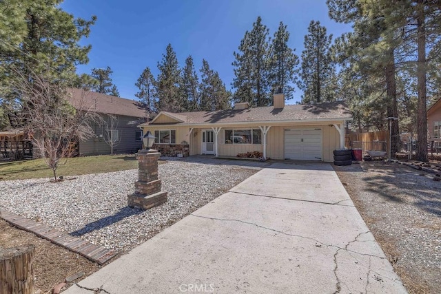 single story home featuring a garage