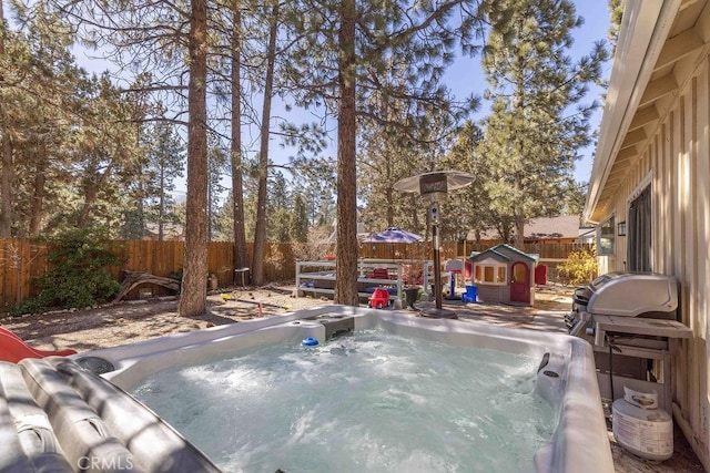 view of pool featuring a hot tub