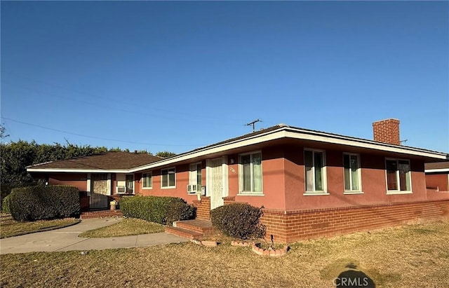 view of home's exterior featuring cooling unit