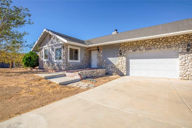 ranch-style home with a garage