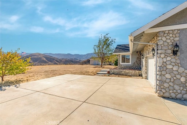 view of patio featuring a mountain view