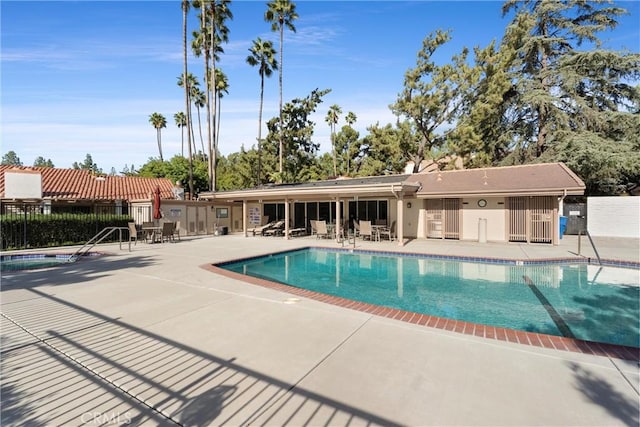 view of pool with a patio area