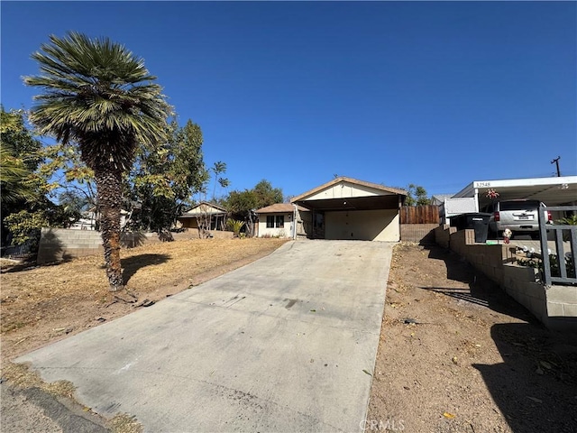 view of front of home featuring a carport