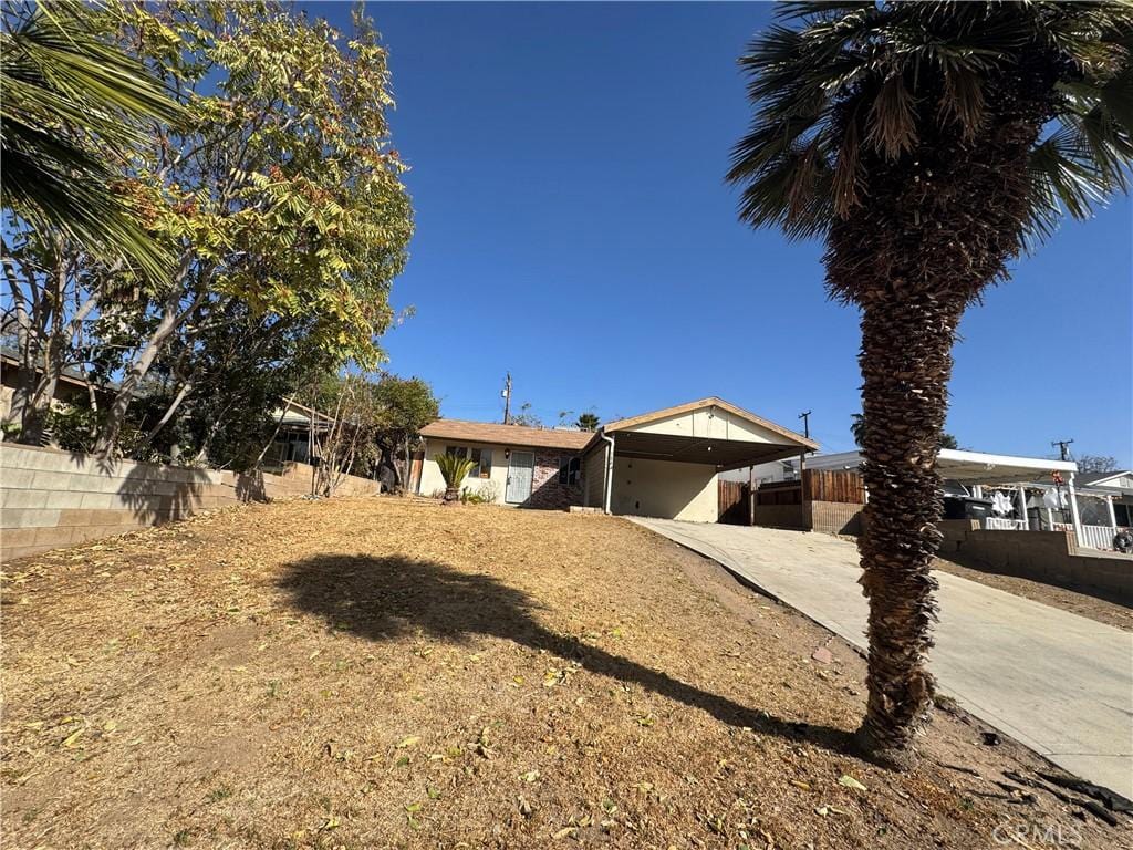 ranch-style house with a carport