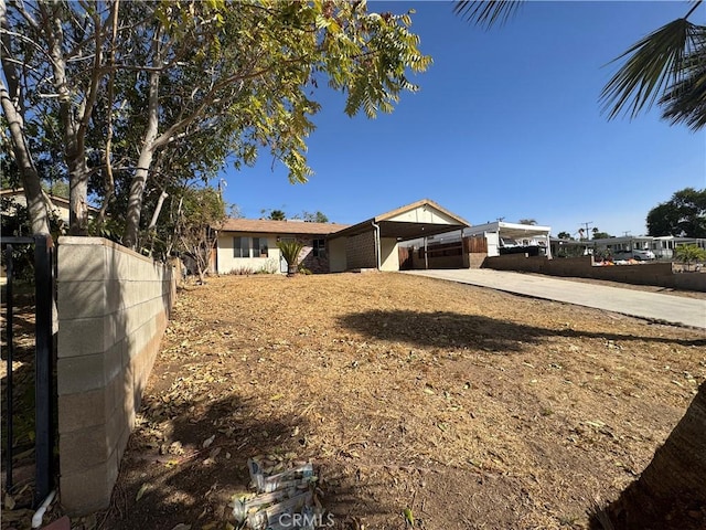 view of yard featuring a carport