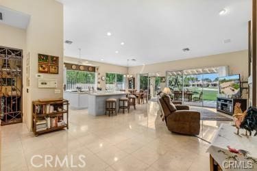 living room featuring light tile patterned flooring