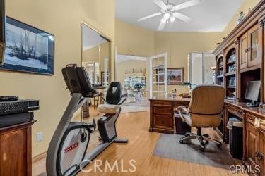 home office featuring light hardwood / wood-style floors and ceiling fan