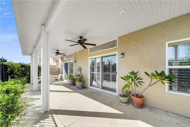 view of patio / terrace featuring ceiling fan