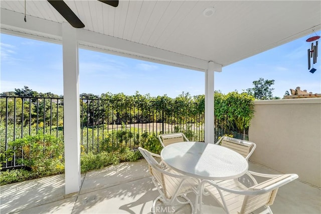 view of patio / terrace featuring ceiling fan