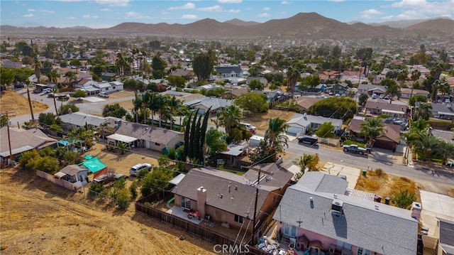 drone / aerial view featuring a mountain view