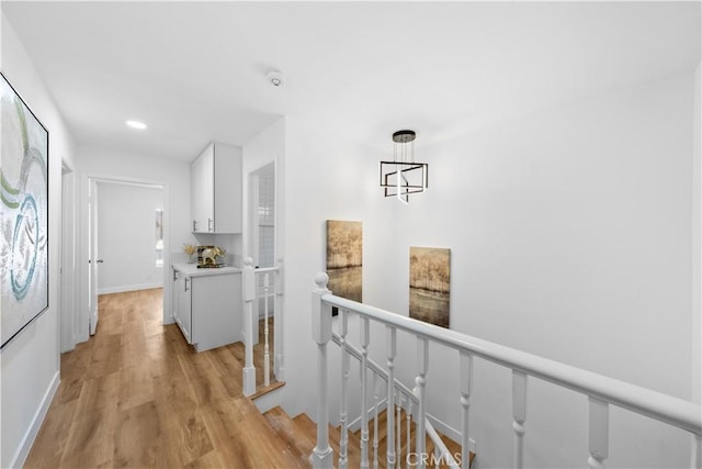 corridor featuring light hardwood / wood-style flooring