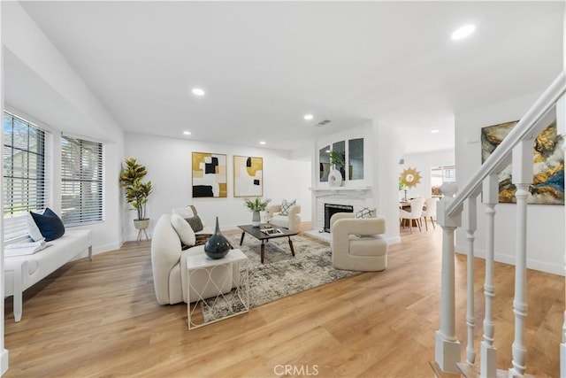 living room with light hardwood / wood-style floors