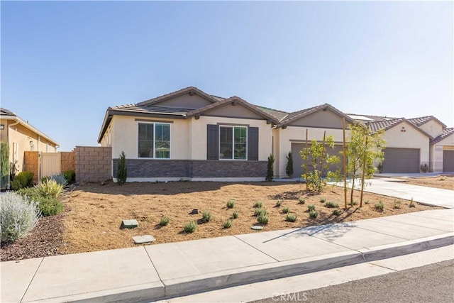 ranch-style home with a garage