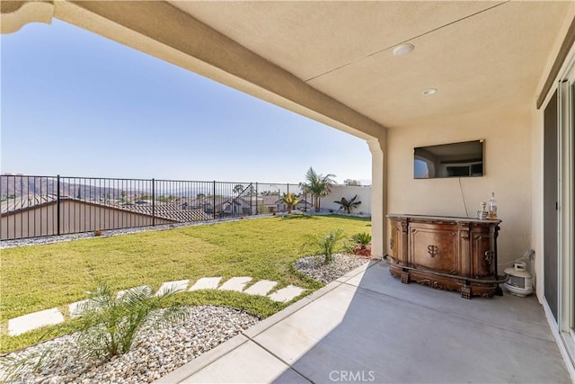 view of patio with a hot tub