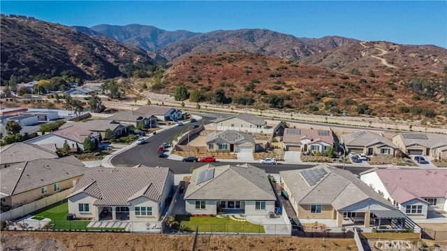 drone / aerial view featuring a mountain view