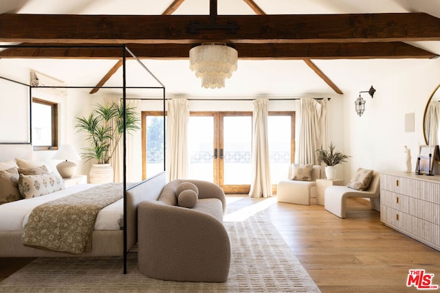 bedroom with vaulted ceiling with beams, light hardwood / wood-style flooring, and multiple windows