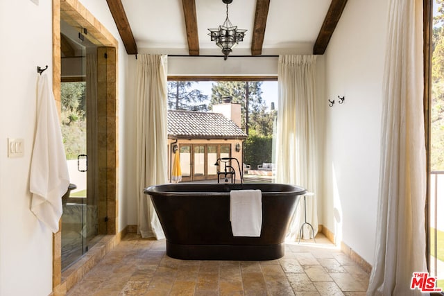 bathroom featuring beamed ceiling, independent shower and bath, and an inviting chandelier