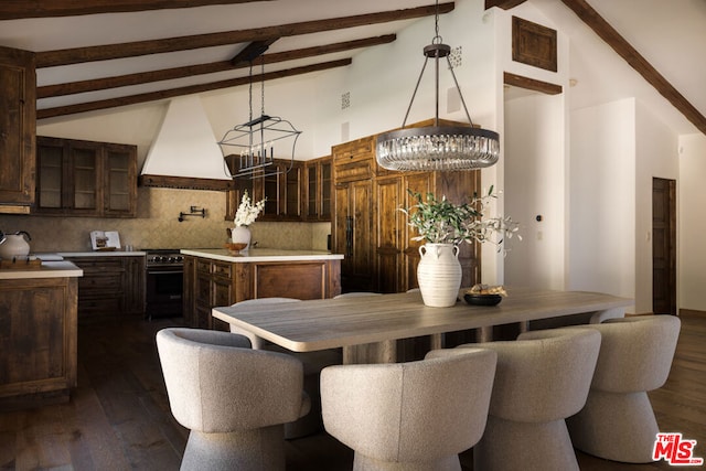 dining room with beam ceiling, dark hardwood / wood-style flooring, and high vaulted ceiling