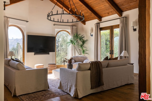 living room with french doors, dark hardwood / wood-style flooring, lofted ceiling with beams, and wood ceiling