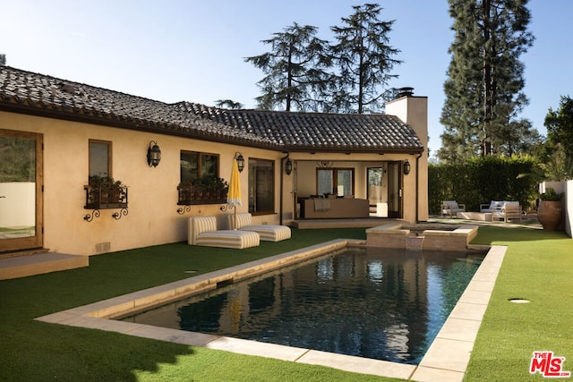 view of pool with an in ground hot tub, an outdoor hangout area, and a patio