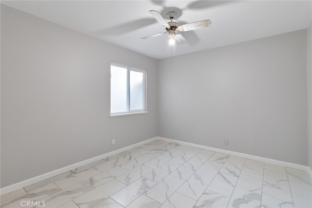 unfurnished room with ceiling fan