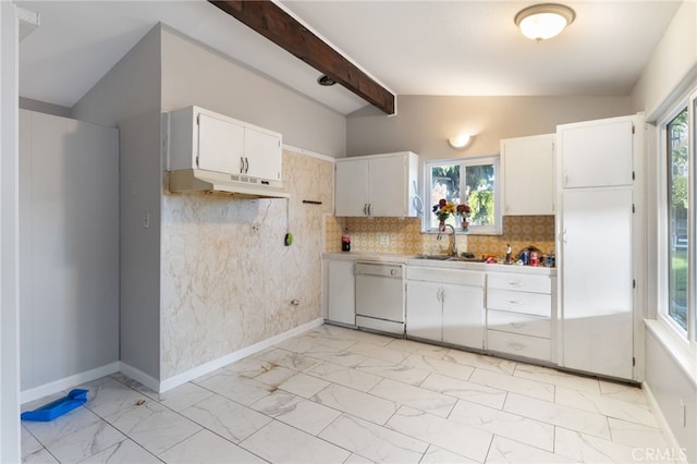 kitchen with white cabinets, tasteful backsplash, sink, lofted ceiling with beams, and dishwasher