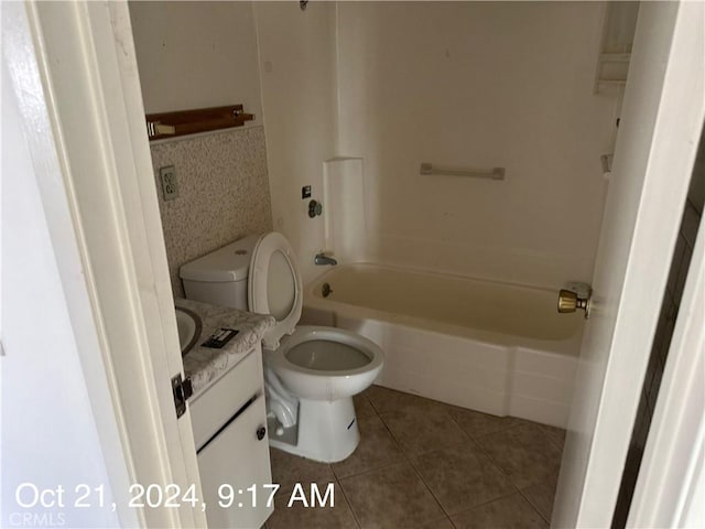 401 Fenmore Dr, Barstow, CA 92311 - full bathroom featuring vanity, tile patterned floors, and washtub / shower combination