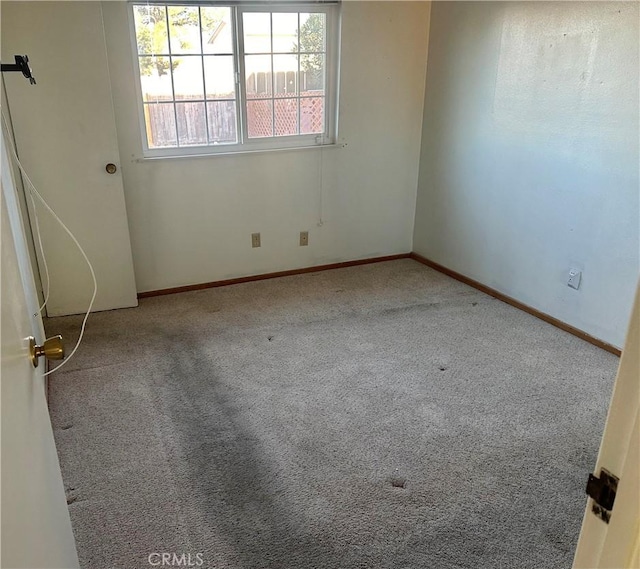 empty room featuring carpet floors